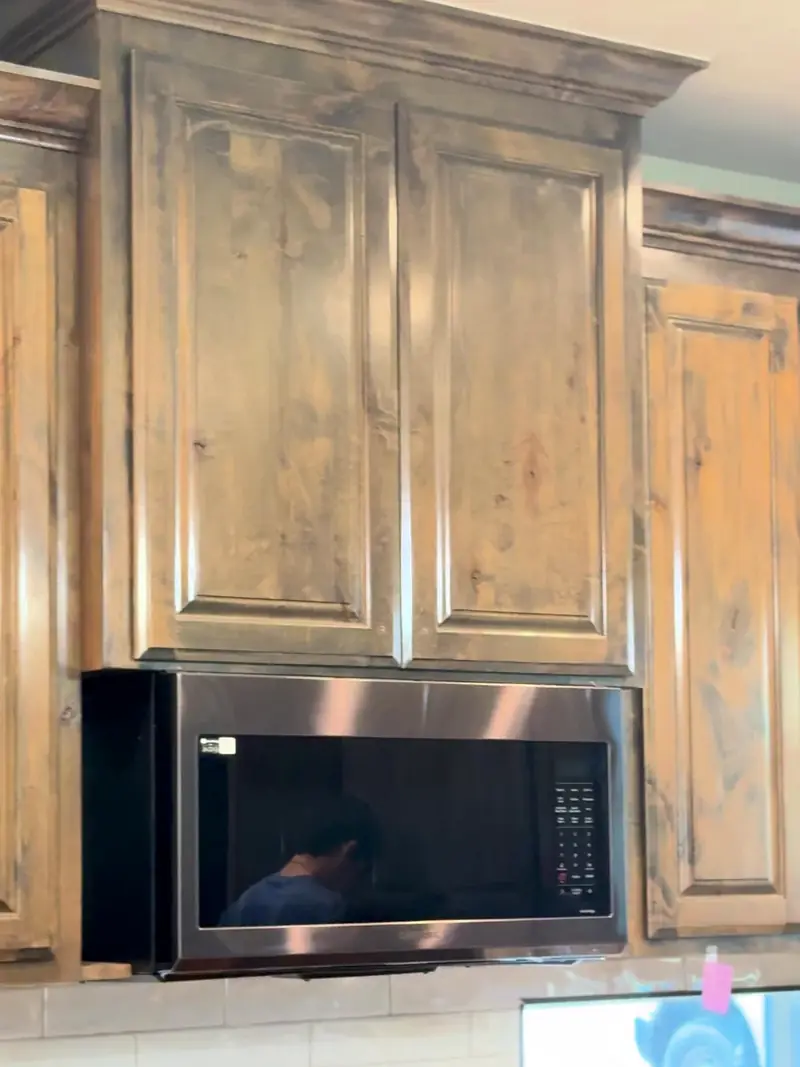 Wood kitchen cabinets finished by Alvarez Painting